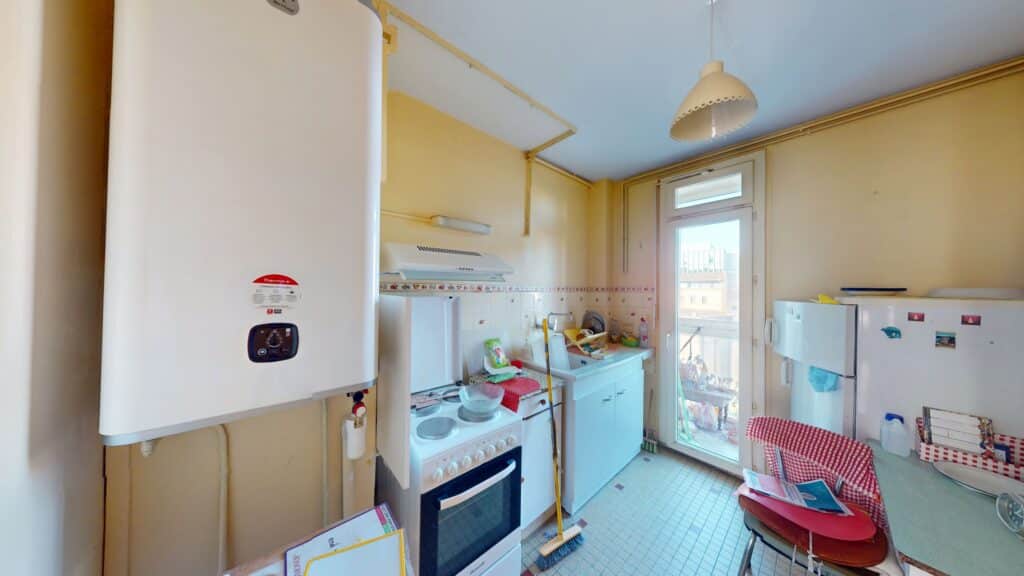 T3 DE 56M2 AVEC ASCENSEUR, BALCON ET CAVE- 19 RUE BAYARD