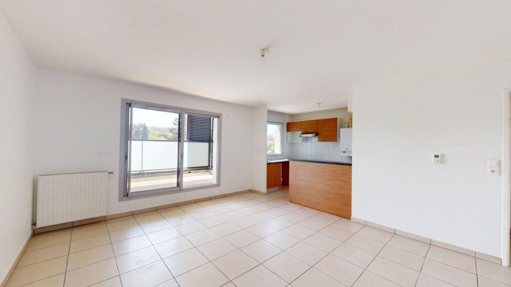 Appartement À Vendre T3 de 65 m² avec ascenseur et place de parking en sous-sol